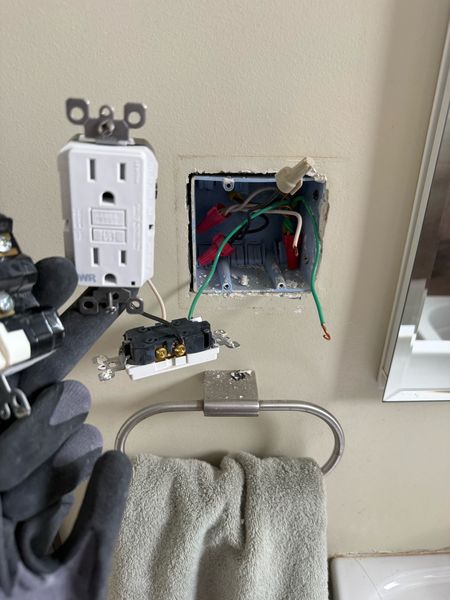 Bathroom GFCI replacement: new GFCI and old outlet – Zion Electric Inc., San Leandro electrician