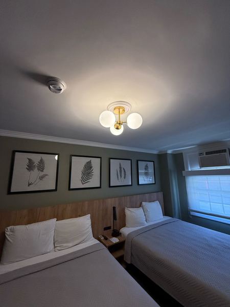 Hotel guest room with a new globe ceiling light β Zion Electric Inc., San Leandro electrician