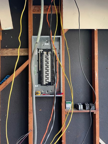 New panel installed with rough-in wiring in an open wall – Zion Electric Inc., San Leandro electrician