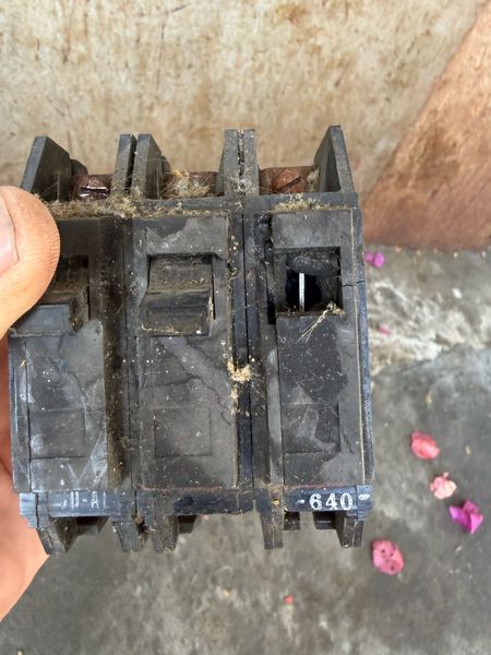 Old melted breaker removed from a panel – Zion Electric Inc., San Leandro electrician