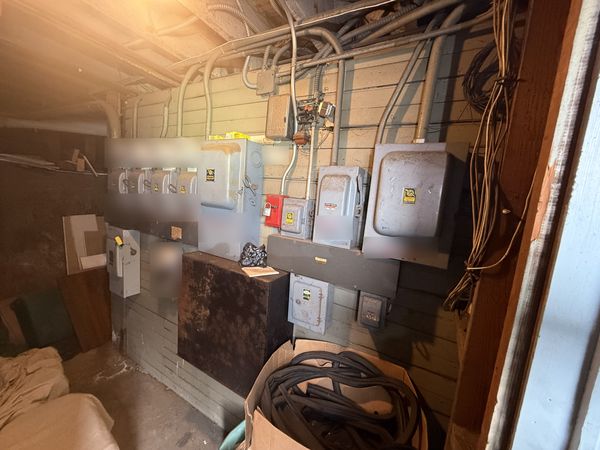 Older meter and disconnect room in a multi-unit building β Zion Electric Inc., San Leandro electrician