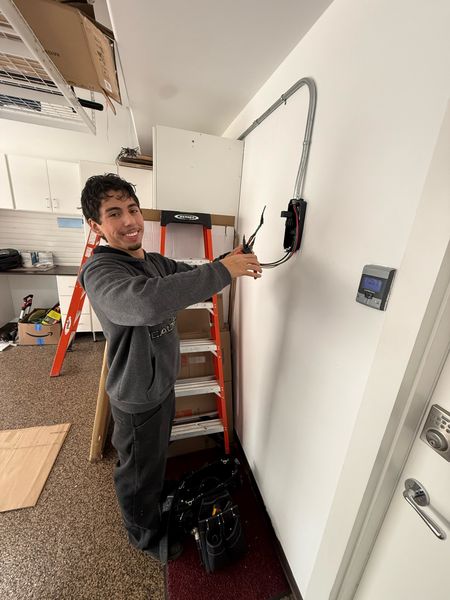 Zion Electric technician installing an EV charger – Zion Electric Inc., San Leandro electrician