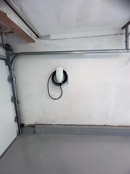 Tesla Wall Connector on a garage wall – Zion Electric Inc., San Leandro electrician