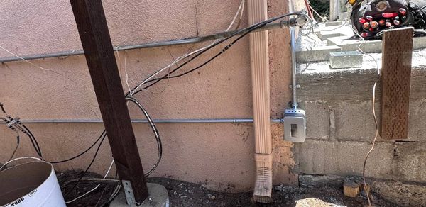 Exterior service and conduit work on a house wall β Zion Electric Inc., San Leandro electrician