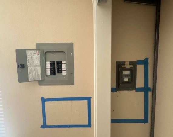Panel relocation: panel/subpanel wall with the new location outlined β Zion Electric Inc., San Leandro electrician